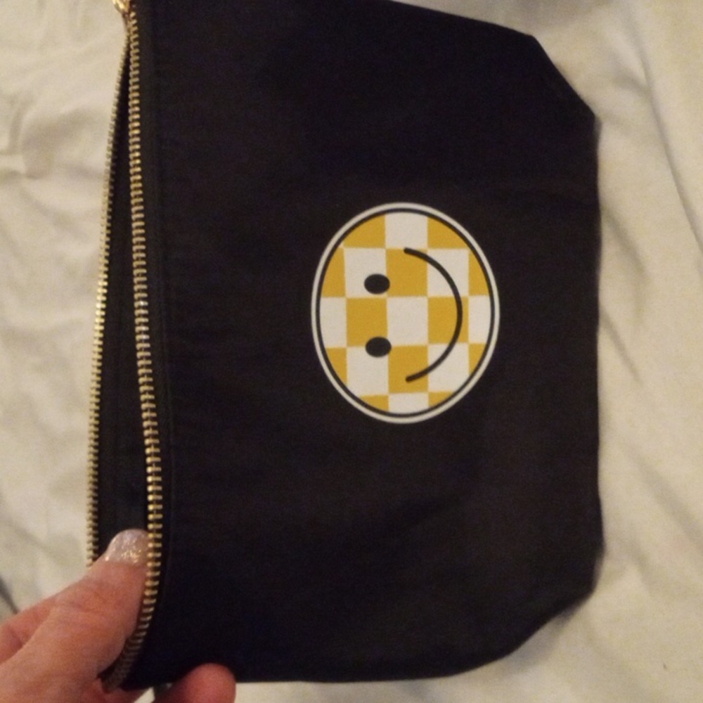 Smiley face pouch